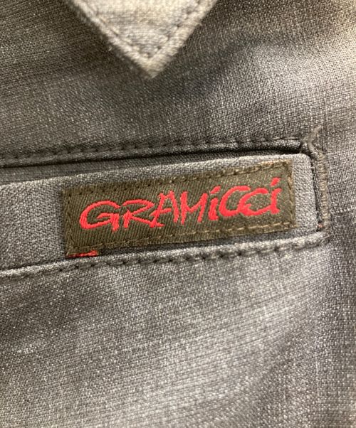 WHITE MOUNTAINEERING（ホワイトマウンテ二アニング）WHITE MOUNTAINEERING (ホワイトマウンテ二アニング) GRAMICCI (グラミチ) クライミングカーゴパンツ ネイビーの古着・服飾アイテム