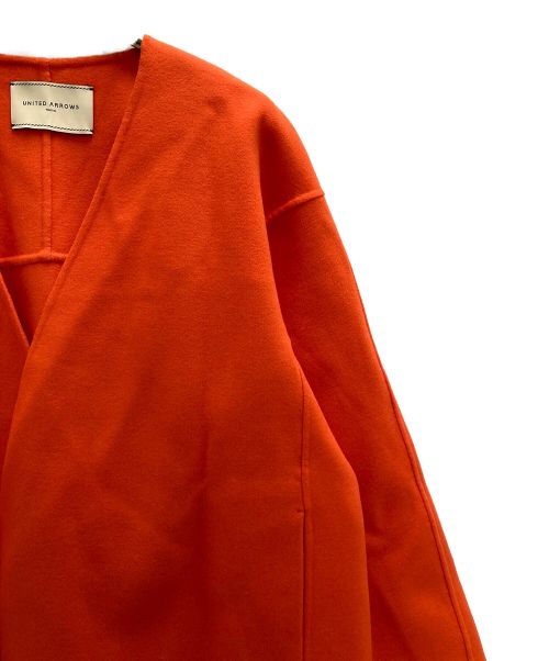 UNITED ARROWS TOKYO（ユナイテッドアローズトウキョウ）UNITED ARROWS TOKYO (ユナイテッドアローズトウキョウ) Vネック リバーショートコート オレンジ サイズ:36の古着・服飾アイテム