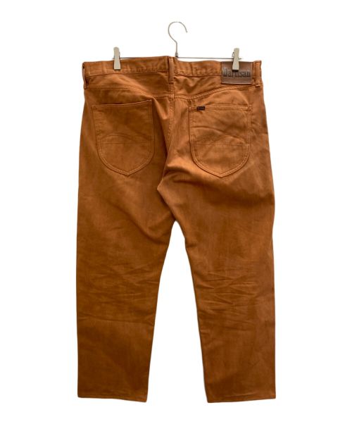 STUDIO D'ARTISAN（ステュディオダルチザン）STUDIO D'ARTISAN (ステュディオダルチザン) 奄美泥染EASTERNERジーンズ オレンジ サイズ:40の古着・服飾アイテム