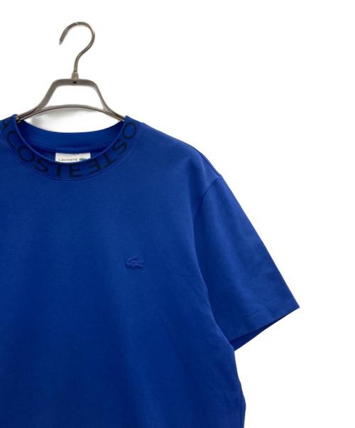 LACOSTE（ラコステ）LACOSTE (ラコステ) ネックロゴTee ブルー サイズ:US Mの古着・服飾アイテム