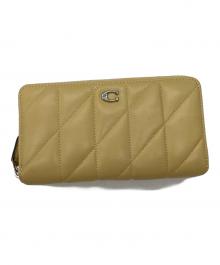 COACH（コーチ）の古着「アコーディオン ジップ ウォレット・ピロー キルティング」｜イエロー