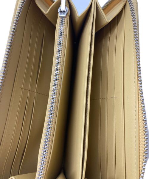 COACH（コーチ）COACH (コーチ) アコーディオン ジップ ウォレット・ピロー キルティング イエローの古着・服飾アイテム