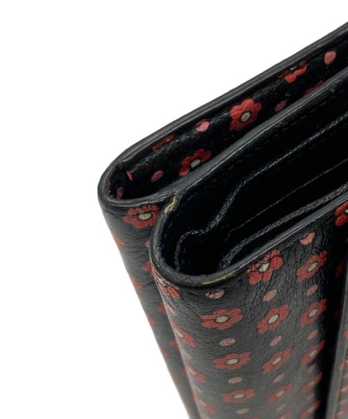 MIU MIU（ミュウミュウ）MIU MIU (ミュウミュウ) レザーフラワーウォレット ブラックの古着・服飾アイテム