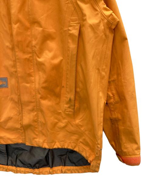 stussy（ステューシー）stussy (ステューシー) マウンテンパーカー オレンジ サイズ:Mの古着・服飾アイテム