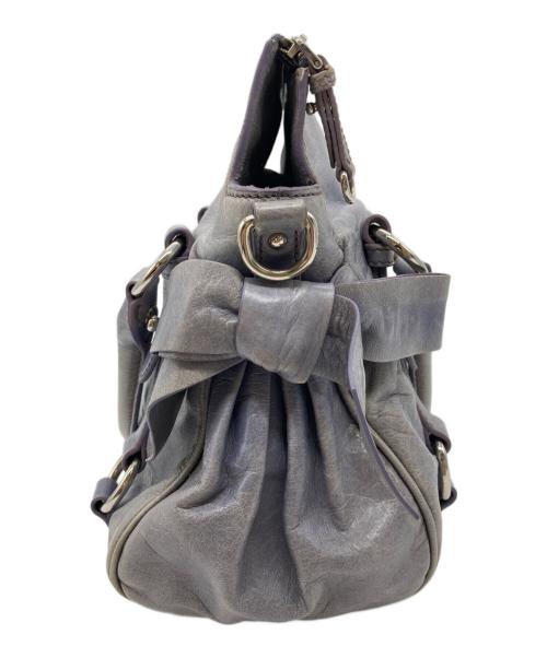 MIU MIU（ミュウミュウ）MIU MIU (ミュウミュウ) サイドリボンヴィッテロラックス ブルーの古着・服飾アイテム