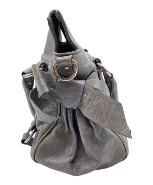 MIU MIU（ミュウミュウ）MIU MIU (ミュウミュウ) サイドリボンヴィッテロラックス ブルーの古着・服飾アイテム