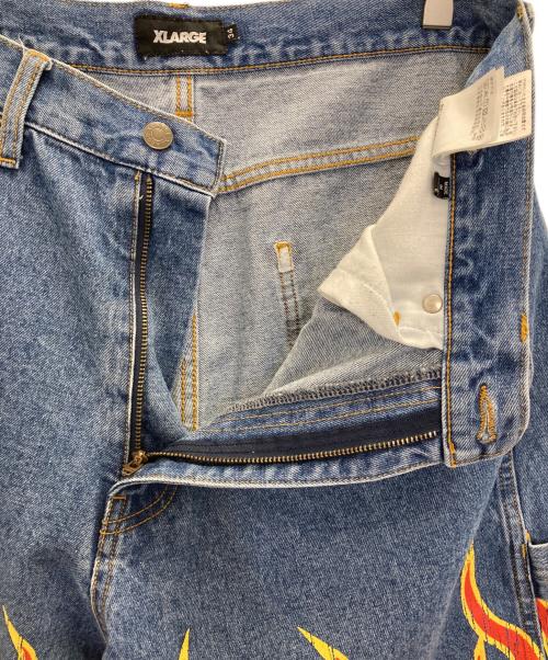 X-LARGE（エクストララージ）X-LARGE (エクストララージ) FLAME DENIM PAINTER SHORT PANTS インディゴ サイズ:表記無しの古着・服飾アイテム