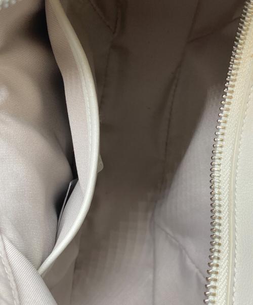 FOLNUA（フォルニュア）FOLNUA (フォルニュア) オーバルバッグ アイボリーの古着・服飾アイテム