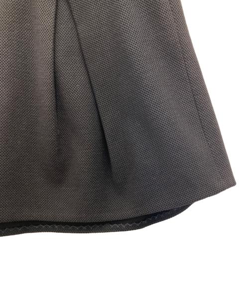 BURBERRY BLUE LABEL（バーバリーロンドンブルーレーベル）BURBERRY BLUE LABEL (バーバリーロンドンブルーレーベル) フロントボタンインバーテッドプリーツミニスカート ブラック サイズ:SIZE38の古着・服飾アイテム