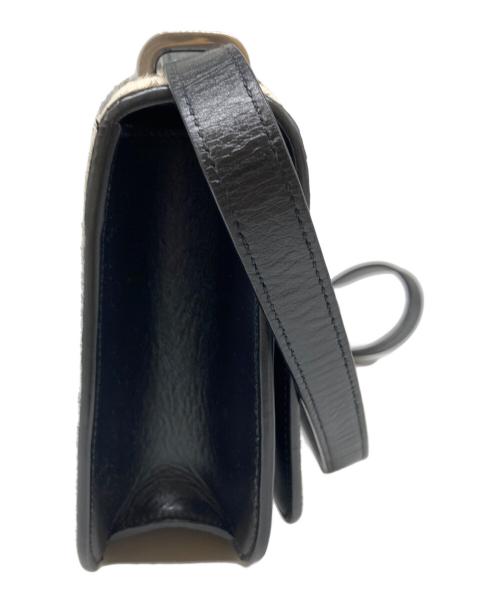 Saint Laurent Paris（サンローランパリ）Saint Laurent Paris (サンローランパリ) ハラコストライプショルダーバッグ ブラック×ホワイトの古着・服飾アイテム