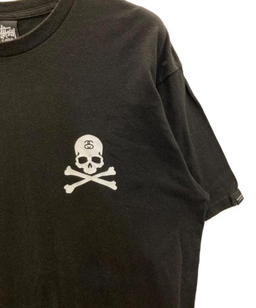 stussy（ステューシー）stussy (ステューシー) Mastermind JAPAN (マスターマインド ジャパン) クロスボーンスカルTee ブラック サイズ:XLの古着・服飾アイテム