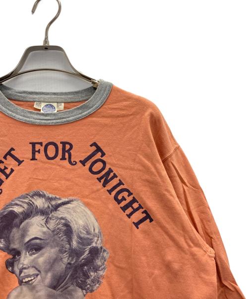 TOYS MCCOY（トイズマッコイ）TOYS McCOY (トイズマッコイ) MILITARY LONG SLEEVE TEE M.MONROE TARGET FOR TONIGHT オレンジ サイズ:Lの古着・服飾アイテム