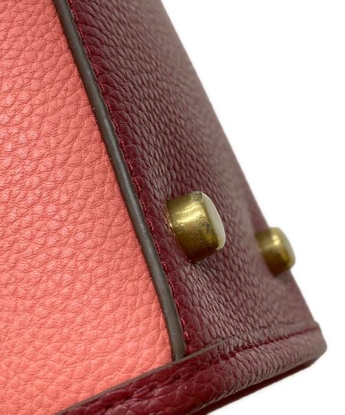 COACH（コーチ）COACH (コーチ) FIELD TOTE 22 レッド×ピンクの古着・服飾アイテム