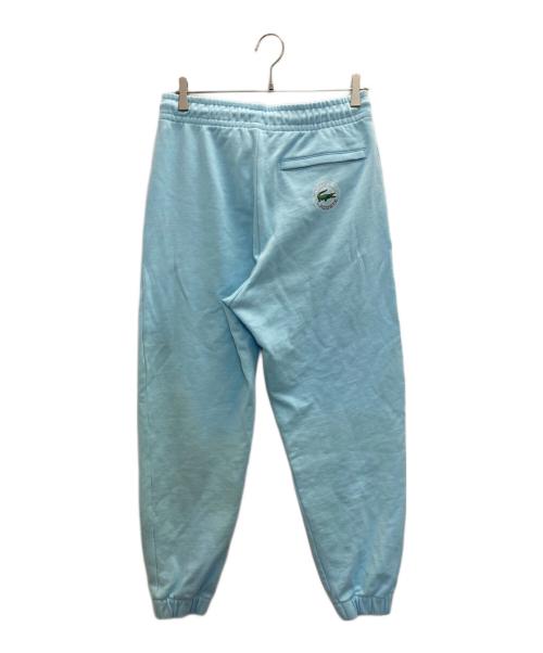AWAKE（アウェイク）AWAKE (アウェイク) LACOSTE (ラコステ) NY スウェットトラックパンツ スカイブルー サイズ:SIZE Mの古着・服飾アイテム