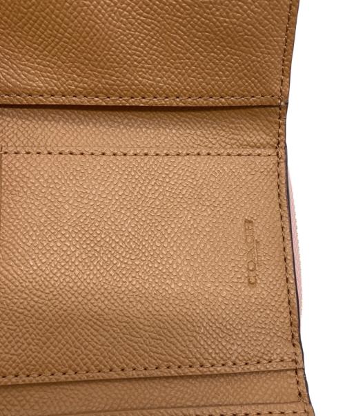 COACH（コーチ）COACH (コーチ) 3つ折り財布 ピンクの古着・服飾アイテム
