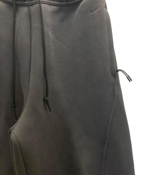 NIKE（ナイキ）NIKE (ナイキ) テックフリースルーズフィット オープンヘム パンツ グレー サイズ:Mの古着・服飾アイテム