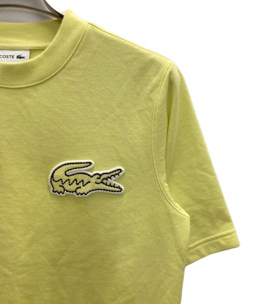 LACOSTE（ラコステ）LACOSTE (ラコステ) オーバーサイズクロックエンブレムスウェットTシャツ イエロー サイズ:XSの古着・服飾アイテム