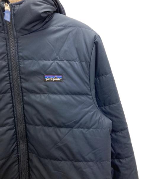 Patagonia（パタゴニア）Patagonia (パタゴニア) キッズ・リバーシブル・レディ・フレディ・フーディ ネイビー サイズ: XXL 16-18の古着・服飾アイテム