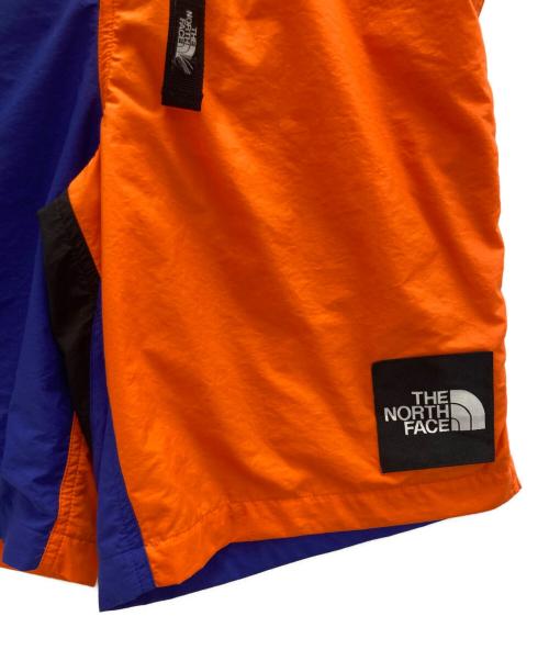 THE NORTH FACE（ザ ノース フェイス）THE NORTH FACE (ザ ノース フェイス) ハーフパンツ ネイビー×オレンジ サイズ:Mの古着・服飾アイテム