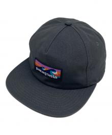 Patagonia（パタゴニア）の古着「ボードショーツ・ラベル・ファンフェアラー・キャップ」｜グレー