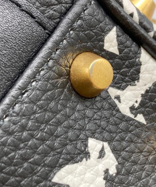 MCM（エムシーエム）MCM (エムシーエム) 2WAY スタッズハンドバッグ ブラック×ホワイトの古着・服飾アイテム