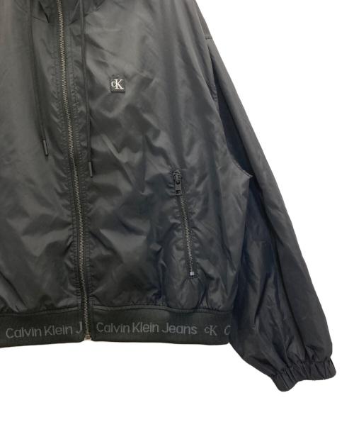 Calvin Klein Jeans（カルバンクラインジーンズ）Calvin Klein Jeans (カルバンクラインジーンズ) パッカブルウィンドブレーカー ブラック サイズ:Sの古着・服飾アイテム