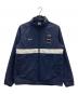 F.C.R.B.（エフシーレアルブリストル）の古着「PACKABLE STAND COLLAR JACKET」｜ネイビー