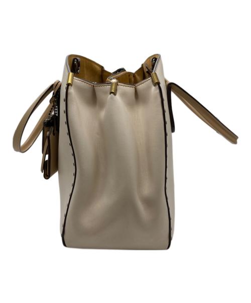 COACH（コーチ）COACH (コーチ) スタッズレザーバッグ ベージュの古着・服飾アイテム