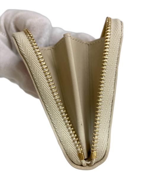 LOUIS VUITTON（ルイ ヴィトン）LOUIS VUITTON (ルイ ヴィトン) ジッピーコインパース レオパード ブロンコライユ　M91484 ベージュ×ピンクの古着・服飾アイテム