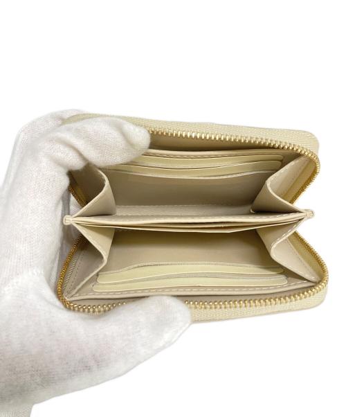 LOUIS VUITTON（ルイ ヴィトン）LOUIS VUITTON (ルイ ヴィトン) ジッピーコインパース レオパード ブロンコライユ　M91484 ベージュ×ピンクの古着・服飾アイテム