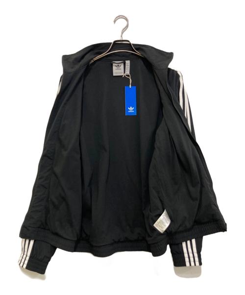 adidas（アディダス）adidas (アディダス) ウーブン ファイヤーバード トラックトップ ブラック サイズ:L 未使用品の古着・服飾アイテム