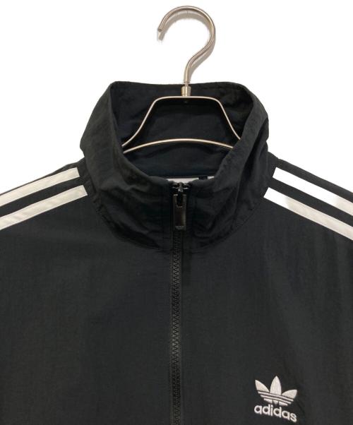adidas（アディダス）adidas (アディダス) ウーブン ファイヤーバード トラックトップ ブラック サイズ:L 未使用品の古着・服飾アイテム