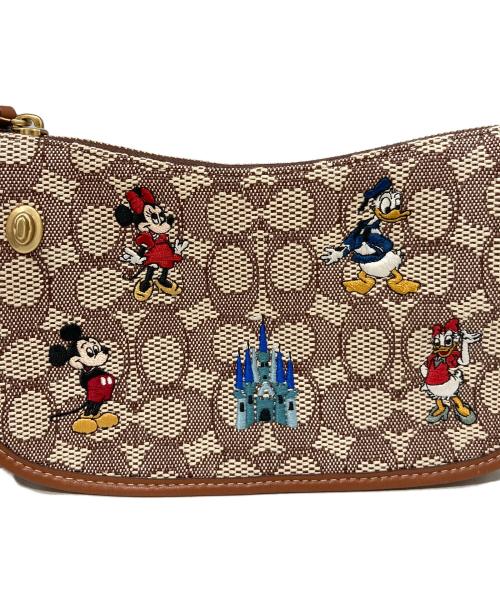 COACH（コーチ）COACH (コーチ) DISNEY (ディズニー) スウィンガーバッグ　C8620 ブラウンの古着・服飾アイテム