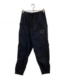 NEW BALANCE（ニューバランス）の古着「Nylon Wind Pants」｜ブラック