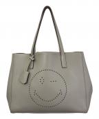 ANYA HINDMARCHアニヤ・ハインドマーチ）の古着「WINK SMILY LEATHER TOTE BAG」｜グレー