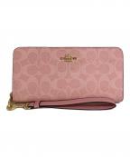 COACHコーチ）の古着「シグネチャーラウンドジップウォレット　CW778」｜ピンク