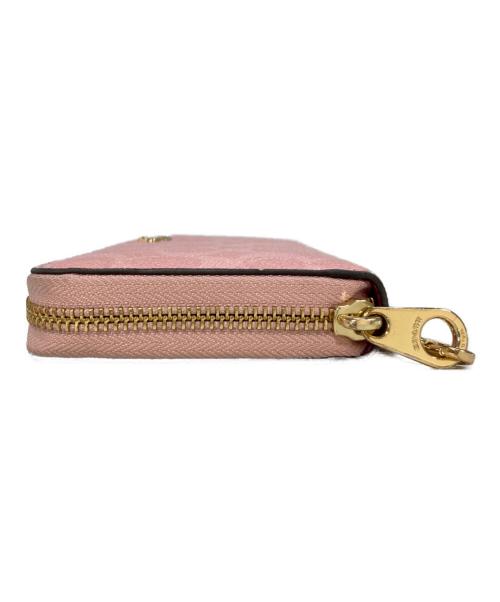 COACH（コーチ）COACH (コーチ) シグネチャーラウンドジップウォレット　CW778 ピンクの古着・服飾アイテム