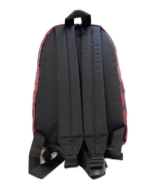 EASTPAK（イーストパック）EASTPAK (イーストパック) KOCHE (コシェ) Orbit Snake Backpack パープルの古着・服飾アイテム