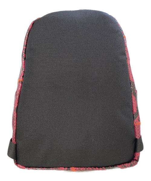 EASTPAK（イーストパック）EASTPAK (イーストパック) KOCHE (コシェ) Orbit Snake Backpack パープルの古着・服飾アイテム