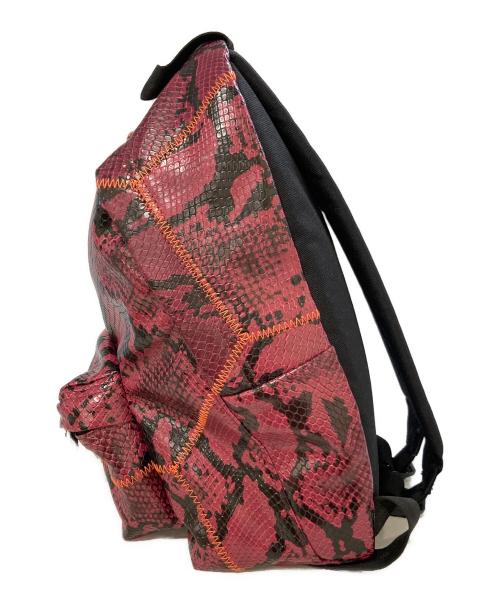 EASTPAK（イーストパック）EASTPAK (イーストパック) KOCHE (コシェ) Orbit Snake Backpack パープルの古着・服飾アイテム