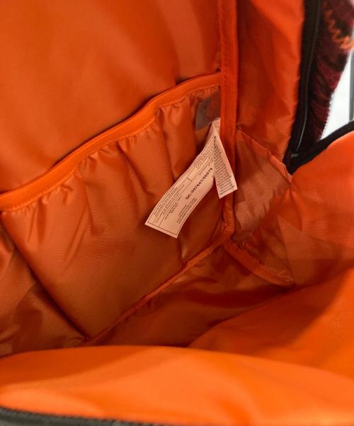 EASTPAK（イーストパック）EASTPAK (イーストパック) KOCHE (コシェ) Orbit Snake Backpack パープルの古着・服飾アイテム