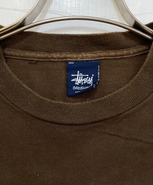 stussy（ステューシー）stussy (ステューシー) 00‘ｓプリントTシャツ ブラウン サイズ:Mの古着・服飾アイテム