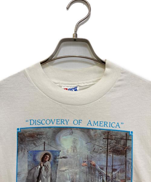 Hanes（ヘインズ）Hanes (ヘインズ) DISCOVERY OF AMERICA プリントカットソー ホワイト サイズ:LARGEの古着・服飾アイテム