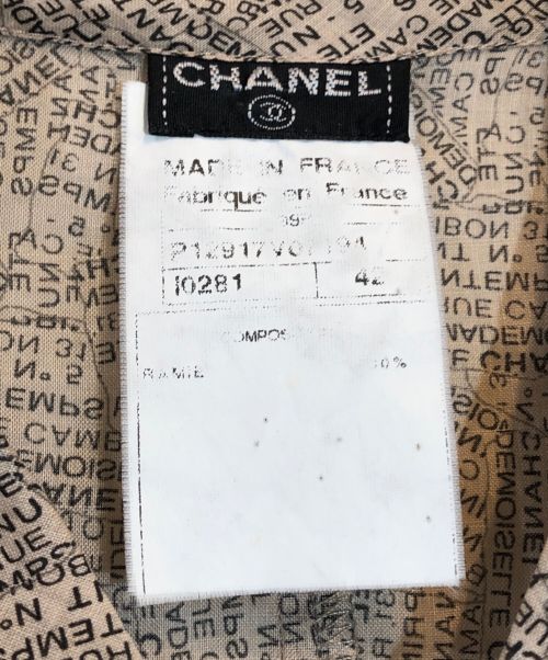 CHANEL（シャネル）CHANEL (シャネル) ラミーニュースペーパーシャツワンピース ベージュ サイズ:42の古着・服飾アイテム