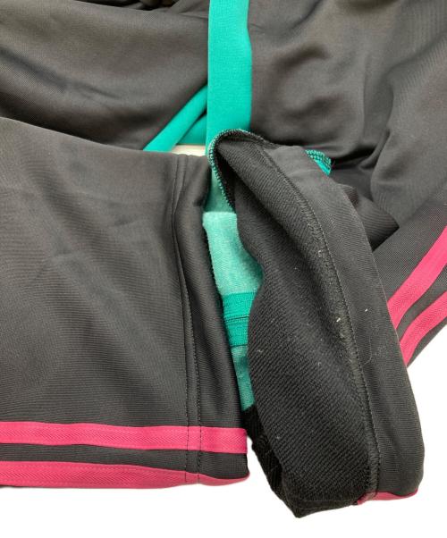 DISCOVERED（ディスカバード）DISCOVERED (ディスカバード) 再構築トラックパンツ グリーン×ブラック サイズ:ウエスト66cmの古着・服飾アイテム