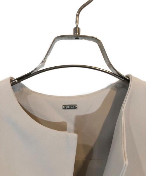 Mila Owen（ミラオーウェン）Mila Owen (ミラオーウェン) マントフレアジャケット ベージュ サイズ:０ 未使用品の古着・服飾アイテム