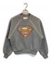 COACH（コーチ）の古着「DC SUPERMANコラボスウェット」｜グレー