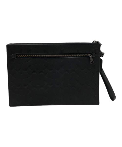 COACH（コーチ）COACH (コーチ) シグネチャーエンボスドクラッチバッグ ブラックの古着・服飾アイテム