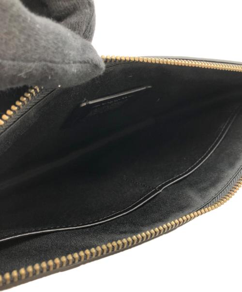 COACH（コーチ）COACH (コーチ) シグネチャーエンボスドクラッチバッグ ブラックの古着・服飾アイテム
