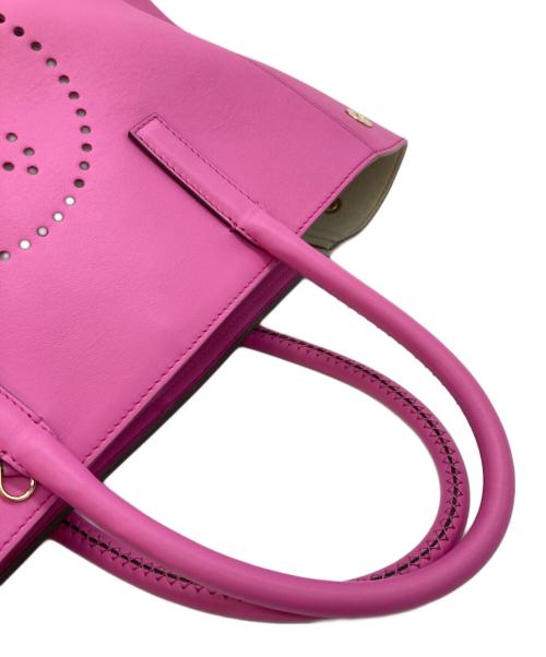 ANYA HINDMARCH（アニヤ・ハインドマーチ）ANYA HINDMARCH (アニヤ・ハインドマーチ) スマイリー パンチング オールレザー トートバッグ ピンクの古着・服飾アイテム